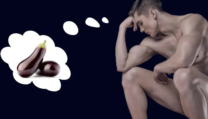 молодой человек без одежды выглядит задумчивым, рядом с ним в облачке изображены баклажаны, о которых он думает