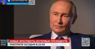 Кадр из видео, на котором Путин даёт Зарубину интервью