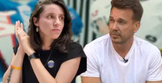 Портреты Марии Лацинской и Михаила Зыгаря на фоне постера "Жаркое соперничество"